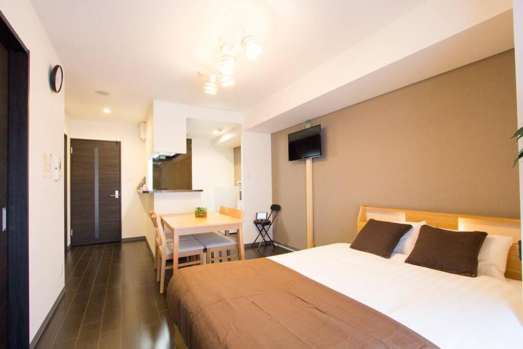 Ferienwohnung ようこそ札幌へ! 大通公園まで地下鉄10分 定員6名 Firetv完備 1階はセコマ Exterior foto