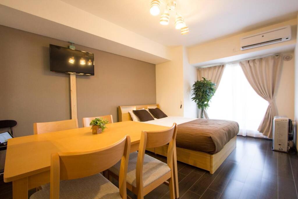 Ferienwohnung ようこそ札幌へ! 大通公園まで地下鉄10分 定員6名 Firetv完備 1階はセコマ Exterior foto